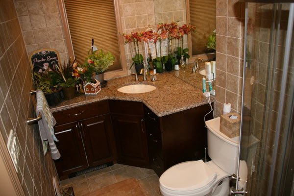 bathroom with corner sink by alure