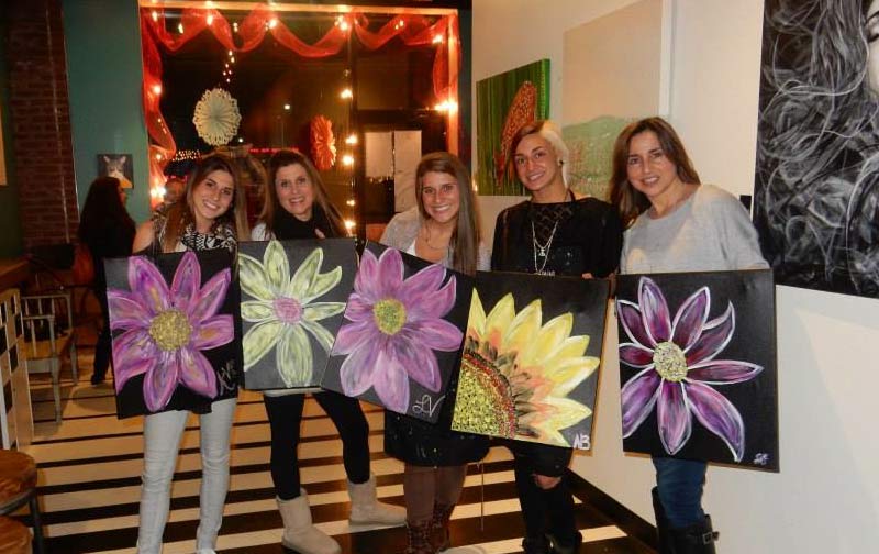 women with flower paintings