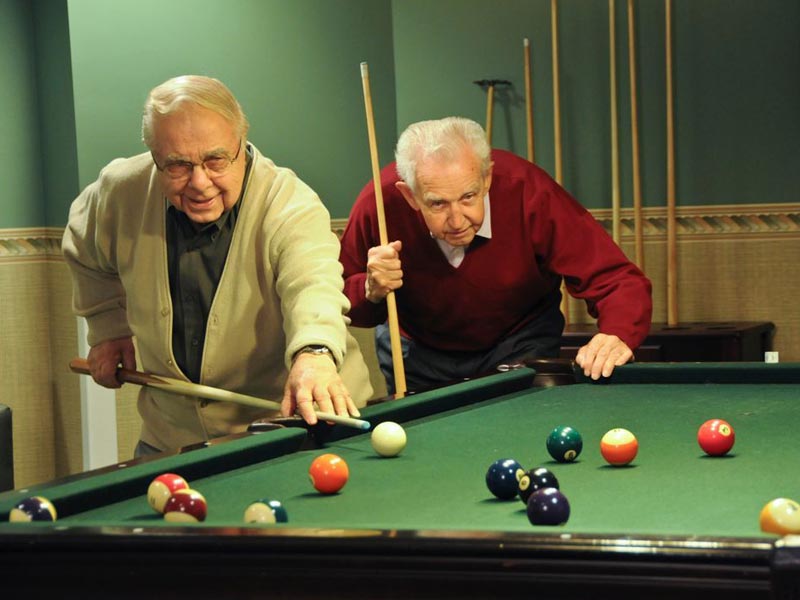 seniors playing pool