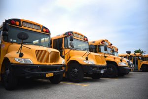 four school busses